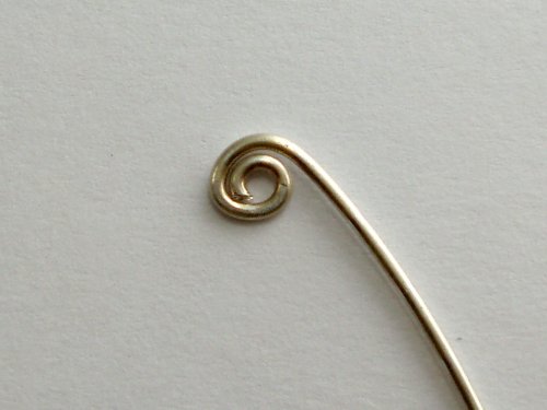 Abby Hook's Spiral Bead Cage - Form spirals, Findings & Components, Toggles & Clasps, Earwire & Headpin, Loops, Wire Loop, Wrapped Wire Loop, Spirals, Wire Spiral, Spiral Wire Wrap, Grasp one loop with the flat nose pliers as shown.